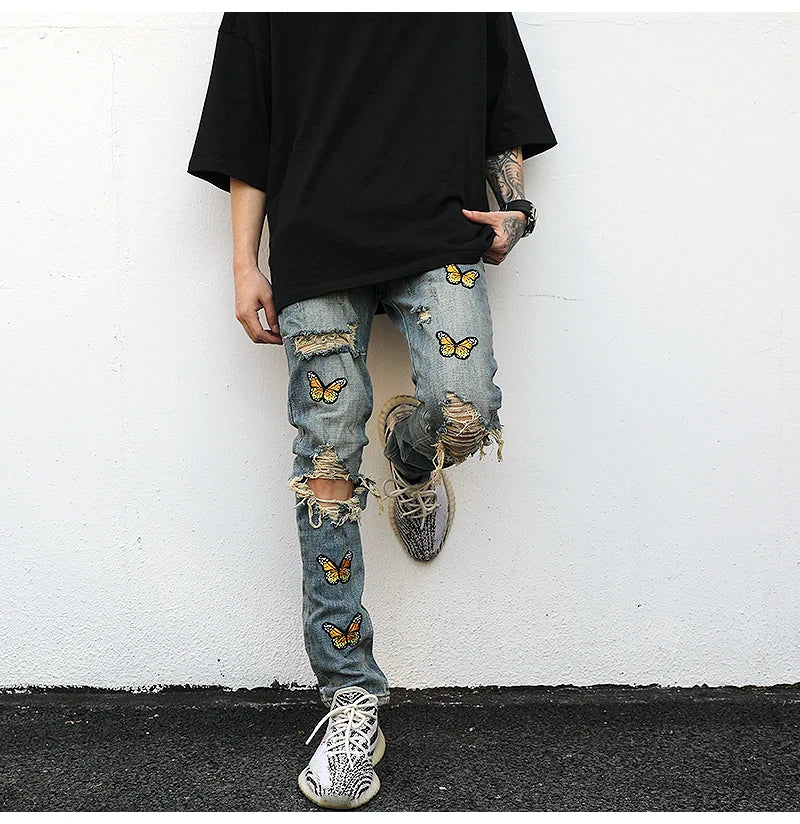 high street butterfly embroidery knee ripped hole jeans mens casual hip hop distressed jeans slim fit skinny denim pants joggers unique joggers style 869