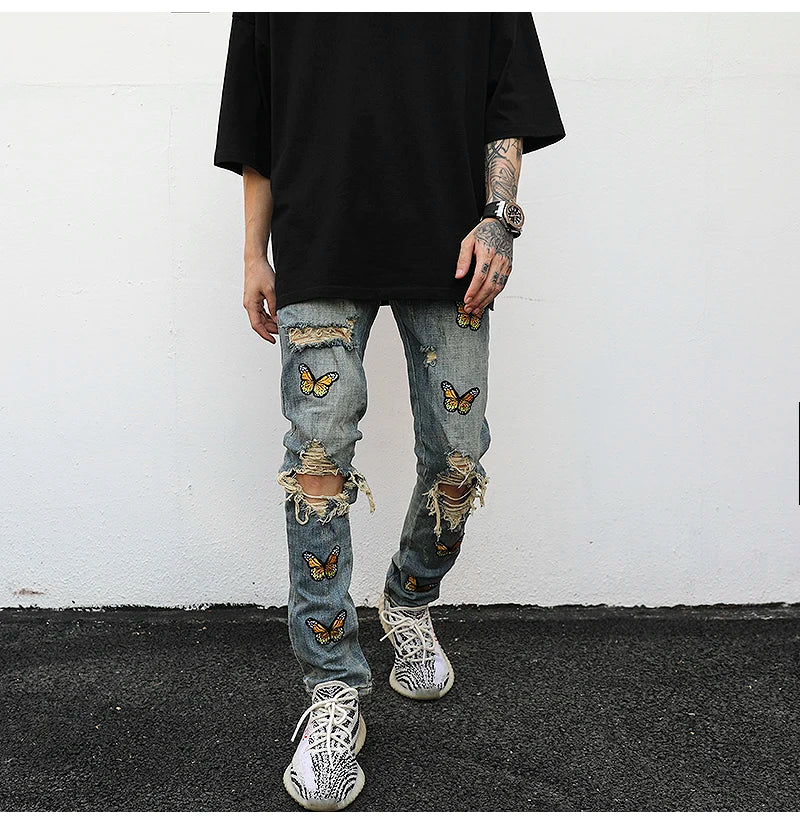 high street butterfly embroidery knee ripped hole jeans mens casual hip hop distressed jeans slim fit skinny denim pants joggers unique joggers style 870