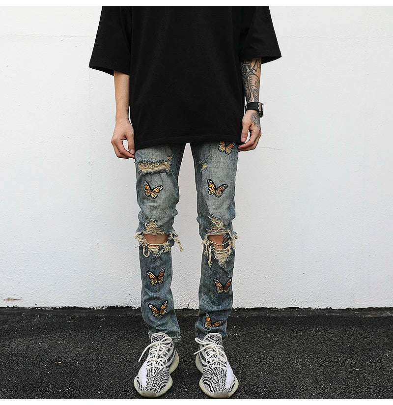 high street butterfly embroidery knee ripped hole jeans mens casual hip hop distressed jeans slim fit skinny denim pants joggers unique joggers style 868