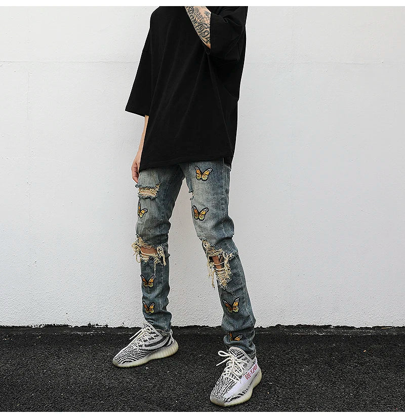 high street butterfly embroidery knee ripped hole jeans mens casual hip hop distressed jeans slim fit skinny denim pants joggers unique joggers style 879