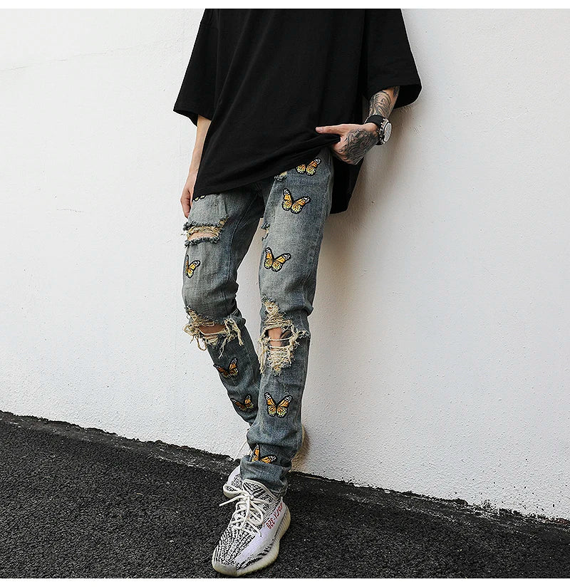 high street butterfly embroidery knee ripped hole jeans mens casual hip hop distressed jeans slim fit skinny denim pants joggers unique joggers style 876