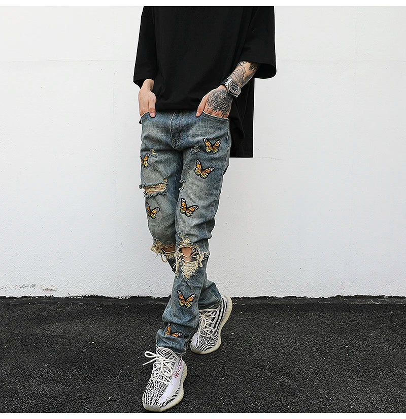 high street butterfly embroidery knee ripped hole jeans mens casual hip hop distressed jeans slim fit skinny denim pants joggers unique joggers style 872