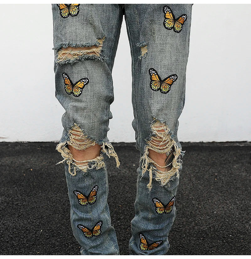 high street butterfly embroidery knee ripped hole jeans mens casual hip hop distressed jeans slim fit skinny denim pants joggers unique joggers style 882