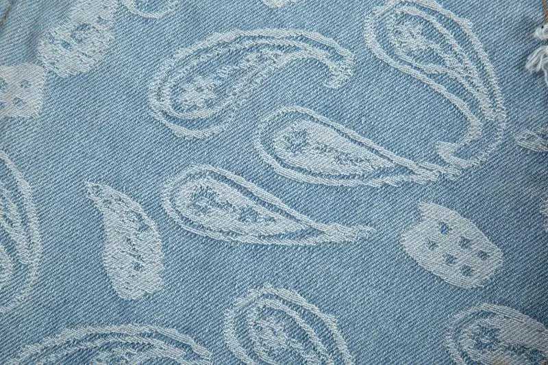 vintage high street washed light blue flared jeans cashew flower jacquard pattern rough edge jeans pants for men and women unique jeans style 931