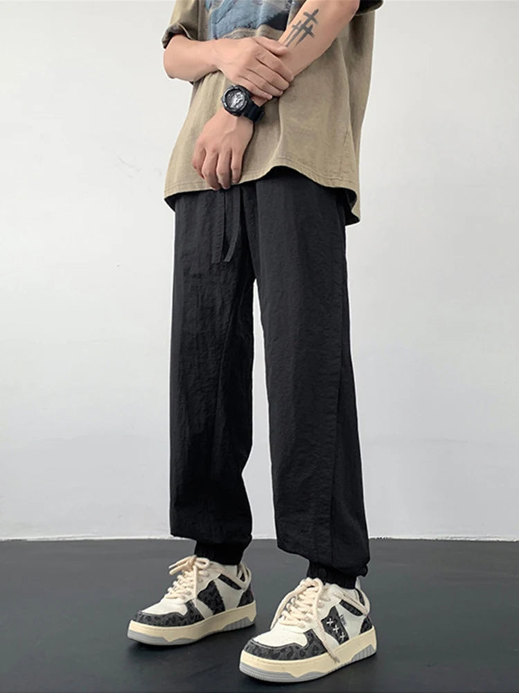 summer mens solid color breathable trousers male casual elastic waist fitness joggers sweatpants autumn baggy straight pants unique joggers style 3536