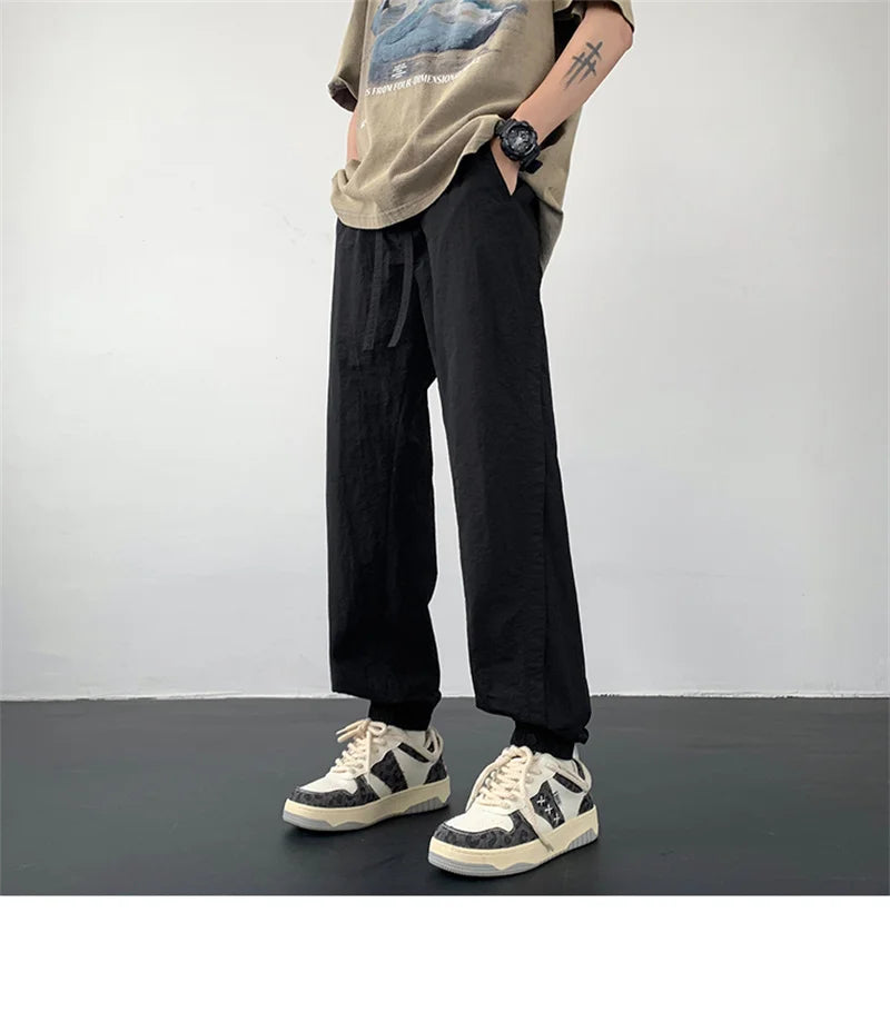 summer mens solid color breathable trousers male casual elastic waist fitness joggers sweatpants autumn baggy straight pants unique joggers style 3527