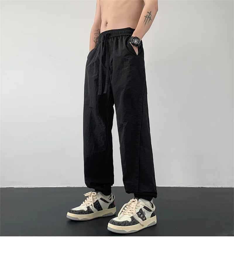 summer mens solid color breathable trousers male casual elastic waist fitness joggers sweatpants autumn baggy straight pants unique joggers style 3534