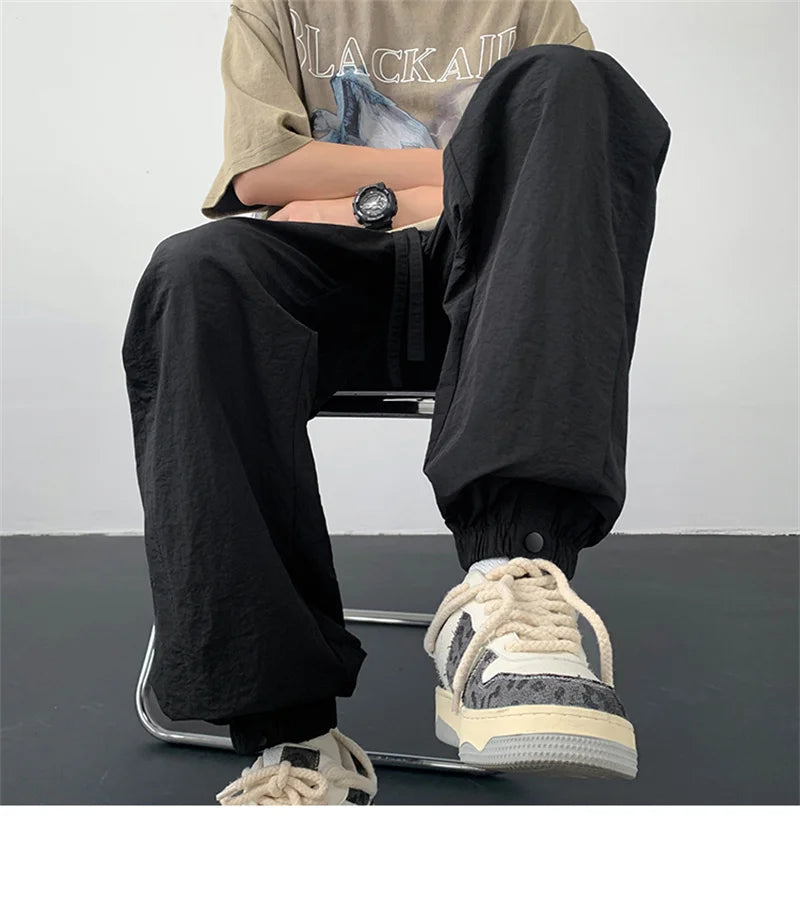 summer mens solid color breathable trousers male casual elastic waist fitness joggers sweatpants autumn baggy straight pants unique joggers style 3531