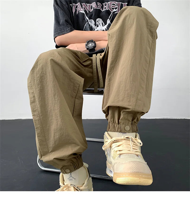 summer mens solid color breathable trousers male casual elastic waist fitness joggers sweatpants autumn baggy straight pants unique joggers style 3523