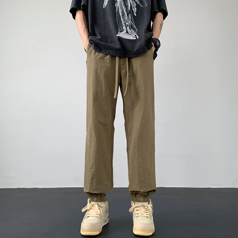 summer mens solid color breathable trousers male casual elastic waist fitness joggers sweatpants autumn baggy straight pants unique joggers style 3513