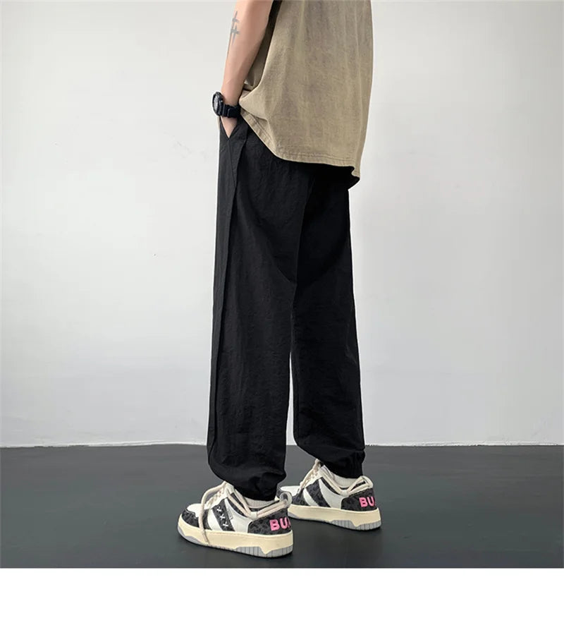 summer mens solid color breathable trousers male casual elastic waist fitness joggers sweatpants autumn baggy straight pants unique joggers style 3526