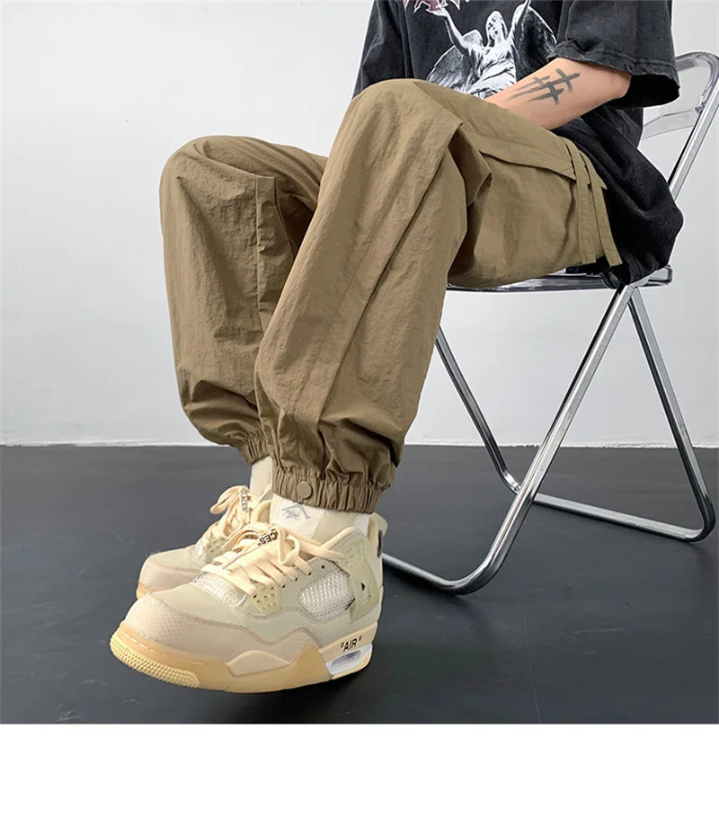 summer mens solid color breathable trousers male casual elastic waist fitness joggers sweatpants autumn baggy straight pants unique joggers style 3522