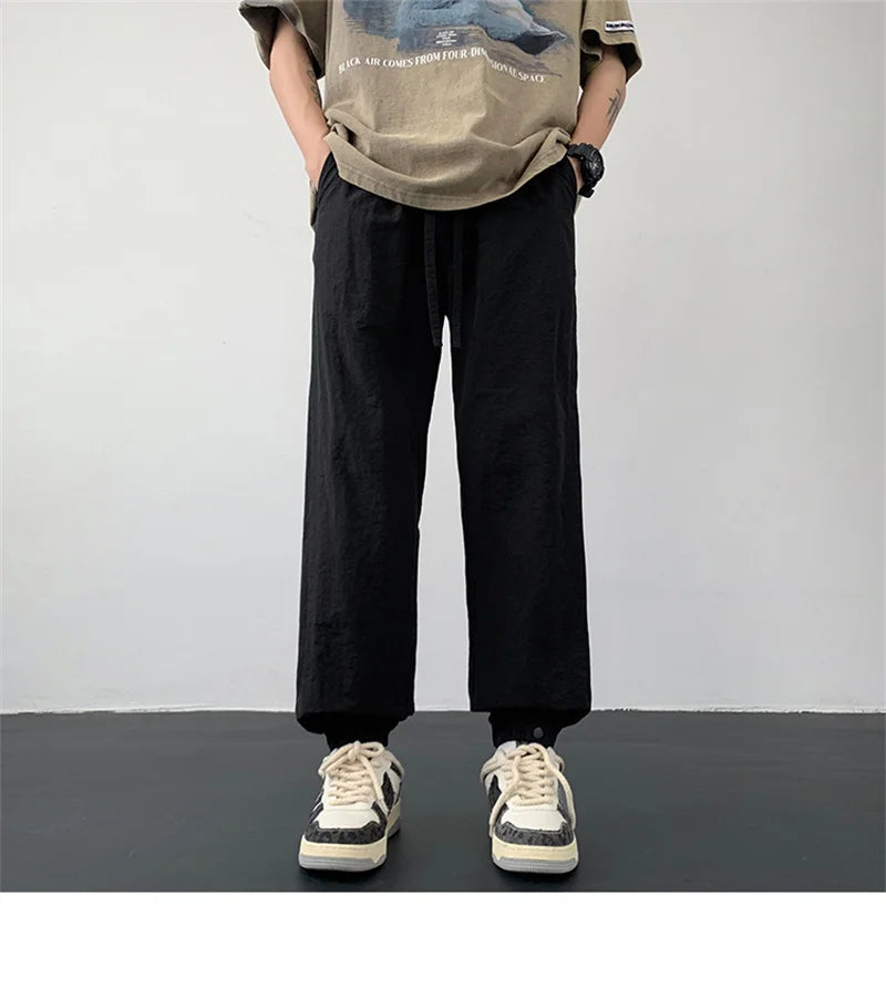 summer mens solid color breathable trousers male casual elastic waist fitness joggers sweatpants autumn baggy straight pants unique joggers style 3528
