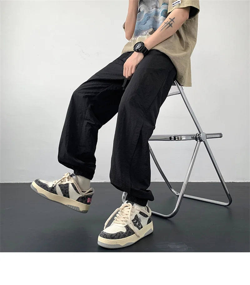 summer mens solid color breathable trousers male casual elastic waist fitness joggers sweatpants autumn baggy straight pants unique joggers style 3533