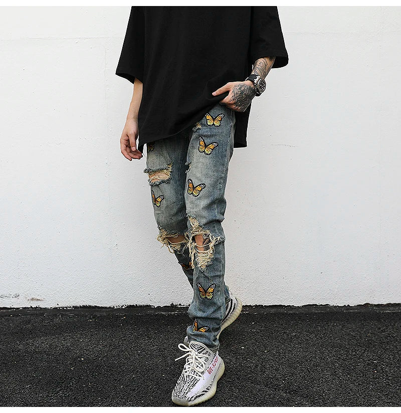 high street butterfly embroidery knee ripped hole jeans mens casual hip hop distressed jeans slim fit skinny denim pants joggers unique joggers style 874