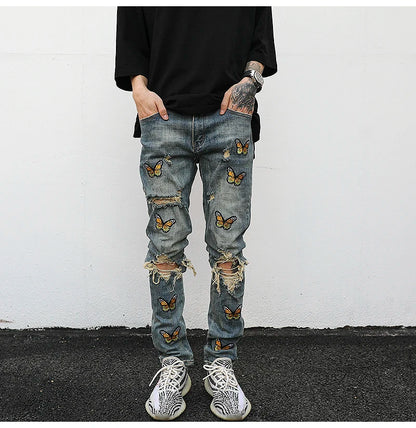 high street butterfly embroidery knee ripped hole jeans mens casual hip hop distressed jeans slim fit skinny denim pants joggers unique joggers style 877