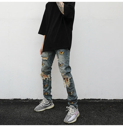 high street butterfly embroidery knee ripped hole jeans mens casual hip hop distressed jeans slim fit skinny denim pants joggers unique joggers style 879