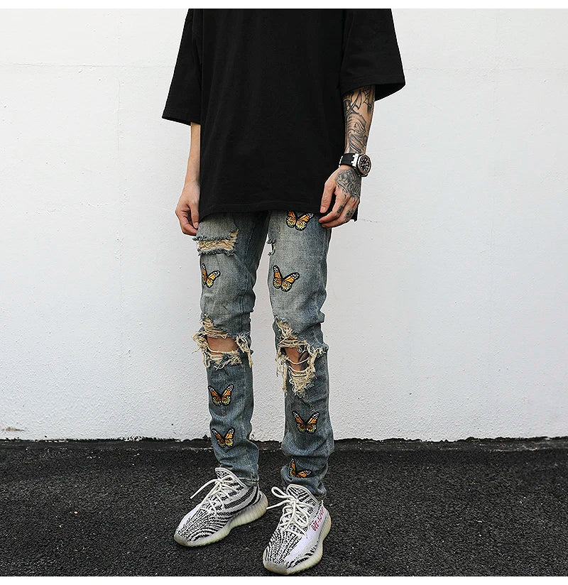 high street butterfly embroidery knee ripped hole jeans mens casual hip hop distressed jeans slim fit skinny denim pants joggers unique joggers style 871