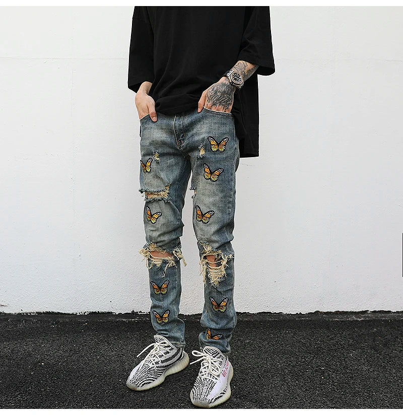 high street butterfly embroidery knee ripped hole jeans mens casual hip hop distressed jeans slim fit skinny denim pants joggers unique joggers style 878
