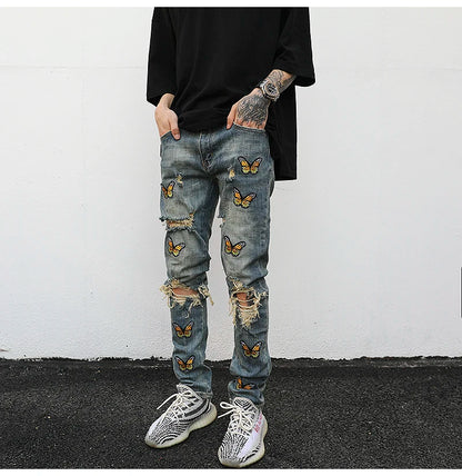 high street butterfly embroidery knee ripped hole jeans mens casual hip hop distressed jeans slim fit skinny denim pants joggers unique joggers style 878