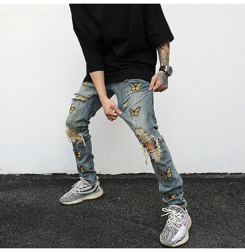 high street butterfly embroidery knee ripped hole jeans mens casual hip hop distressed jeans slim fit skinny denim pants joggers unique joggers style 875