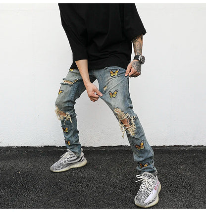 high street butterfly embroidery knee ripped hole jeans mens casual hip hop distressed jeans slim fit skinny denim pants joggers unique joggers style 875
