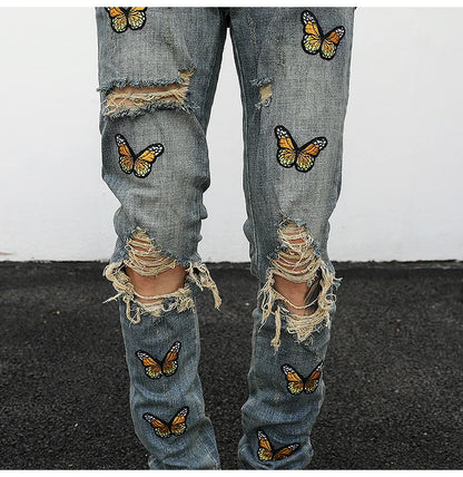 high street butterfly embroidery knee ripped hole jeans mens casual hip hop distressed jeans slim fit skinny denim pants joggers unique joggers style 882