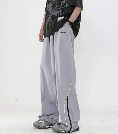 Spring autumn Korean windbreak loose sports pants men fashion street Y2K couple personality retro wide leg straight leg pants Street King Limited
