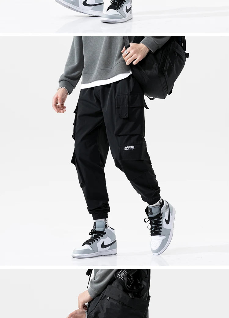 streetwear mens hip hop jogging pants casual men trousers big size loose sweatpants male 2023 new multi pocket harem pants 5xl unique joggers style 2700