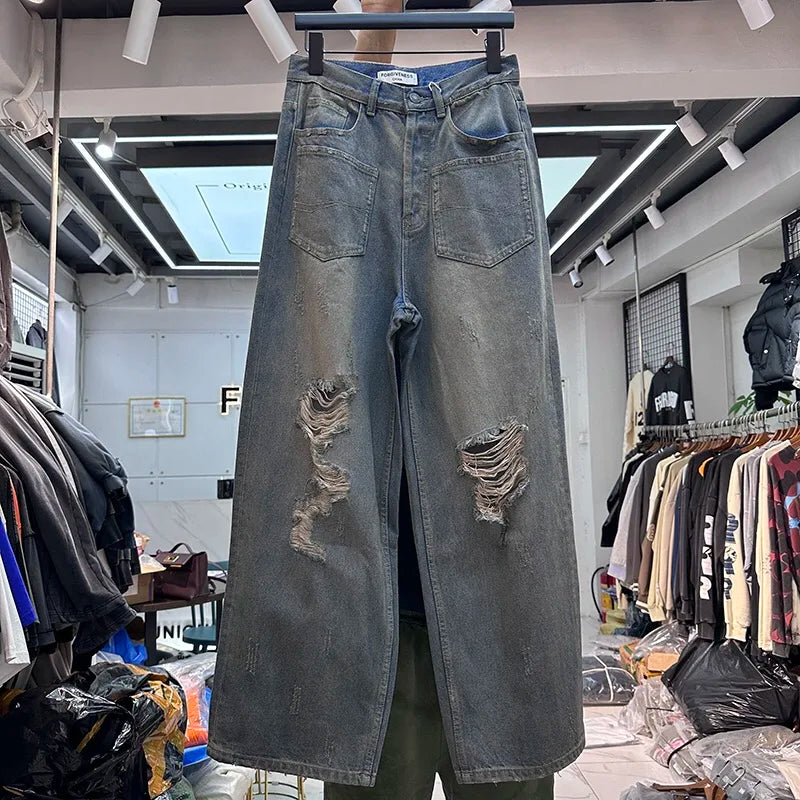 Cut Jeans with a mud-dye knife Street King Limited