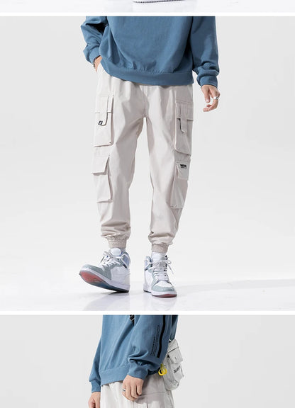 streetwear mens hip hop jogging pants casual men trousers big size loose sweatpants male 2023 new multi pocket harem pants 5xl unique joggers style 2703