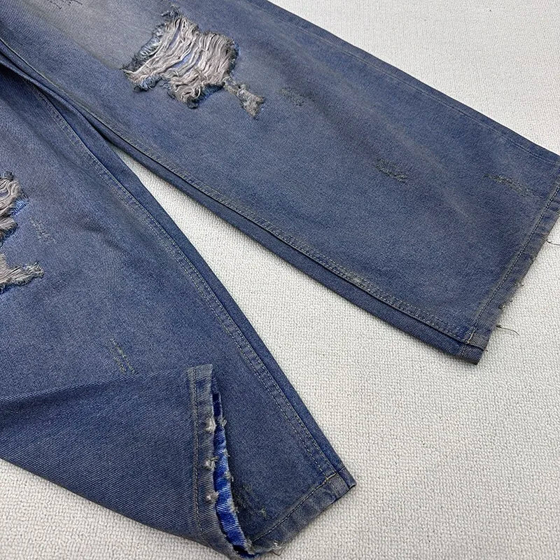Cut Jeans with a mud-dye knife Street King Limited