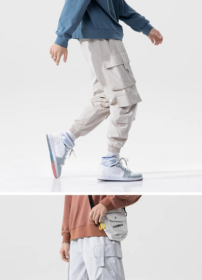 streetwear mens hip hop jogging pants casual men trousers big size loose sweatpants male 2023 new multi pocket harem pants 5xl unique joggers style 2706