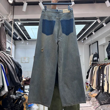 Cut Jeans with a mud-dye knife Street King Limited