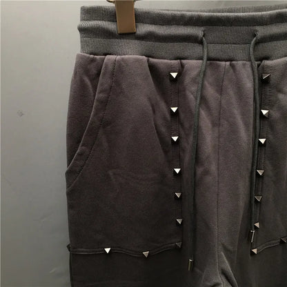 high new novelty luxury men 2022 classic full metal rivets pockets comfortable cotton parkour sweat casual pants sweatpants d50 unique joggers style 4232
