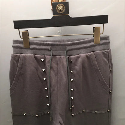 high new novelty luxury men 2022 classic full metal rivets pockets comfortable cotton parkour sweat casual pants sweatpants d50 unique joggers style 4231