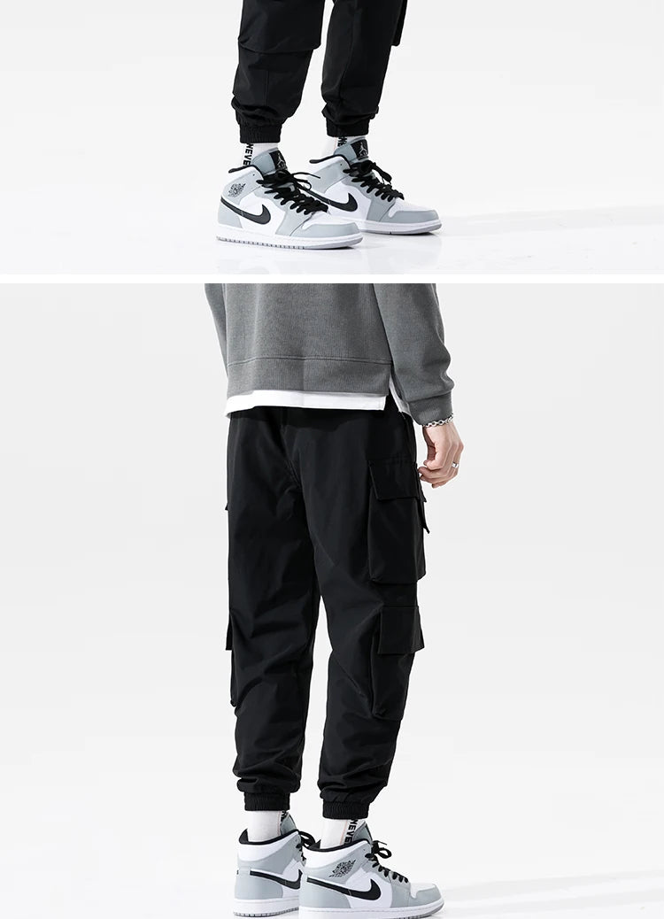 streetwear mens hip hop jogging pants casual men trousers big size loose sweatpants male 2023 new multi pocket harem pants 5xl unique joggers style 2702