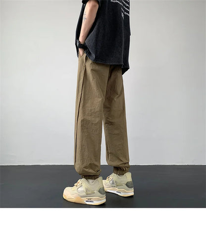 summer mens solid color breathable trousers male casual elastic waist fitness joggers sweatpants autumn baggy straight pants unique joggers style 3517